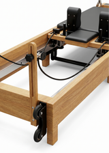 Pilates Reformer PeachLates™ Signature aus massivem Eichenholz